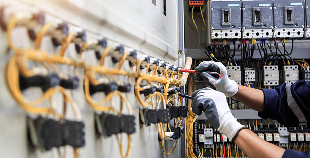 Professional Electrician technician working in Nora Springs, IA